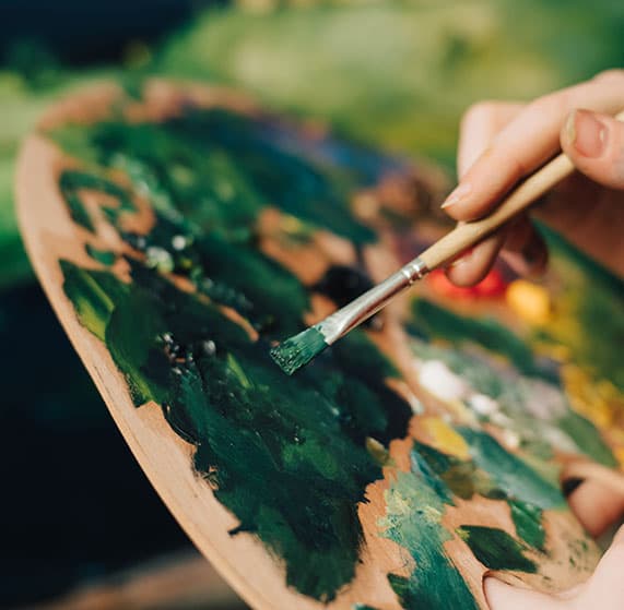 An artist painting a commissioned work