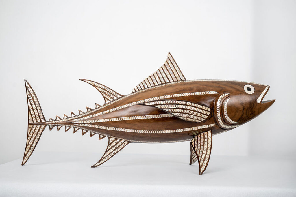 Broken wooden fish after restoration